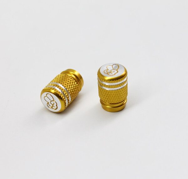 Art. 2170 Ventilkappen Peace (2 Stück) gold eloxiert(shop).jpg
